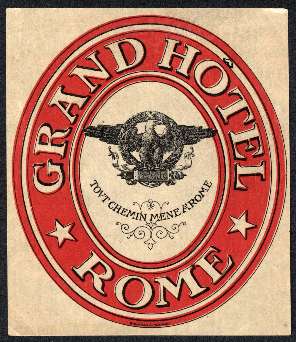 A 1950s luggage sticker from a grand hotel in Rome, red and cream